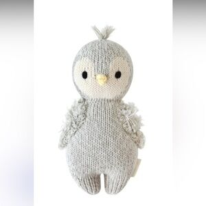 Cuddle and kind baby owl